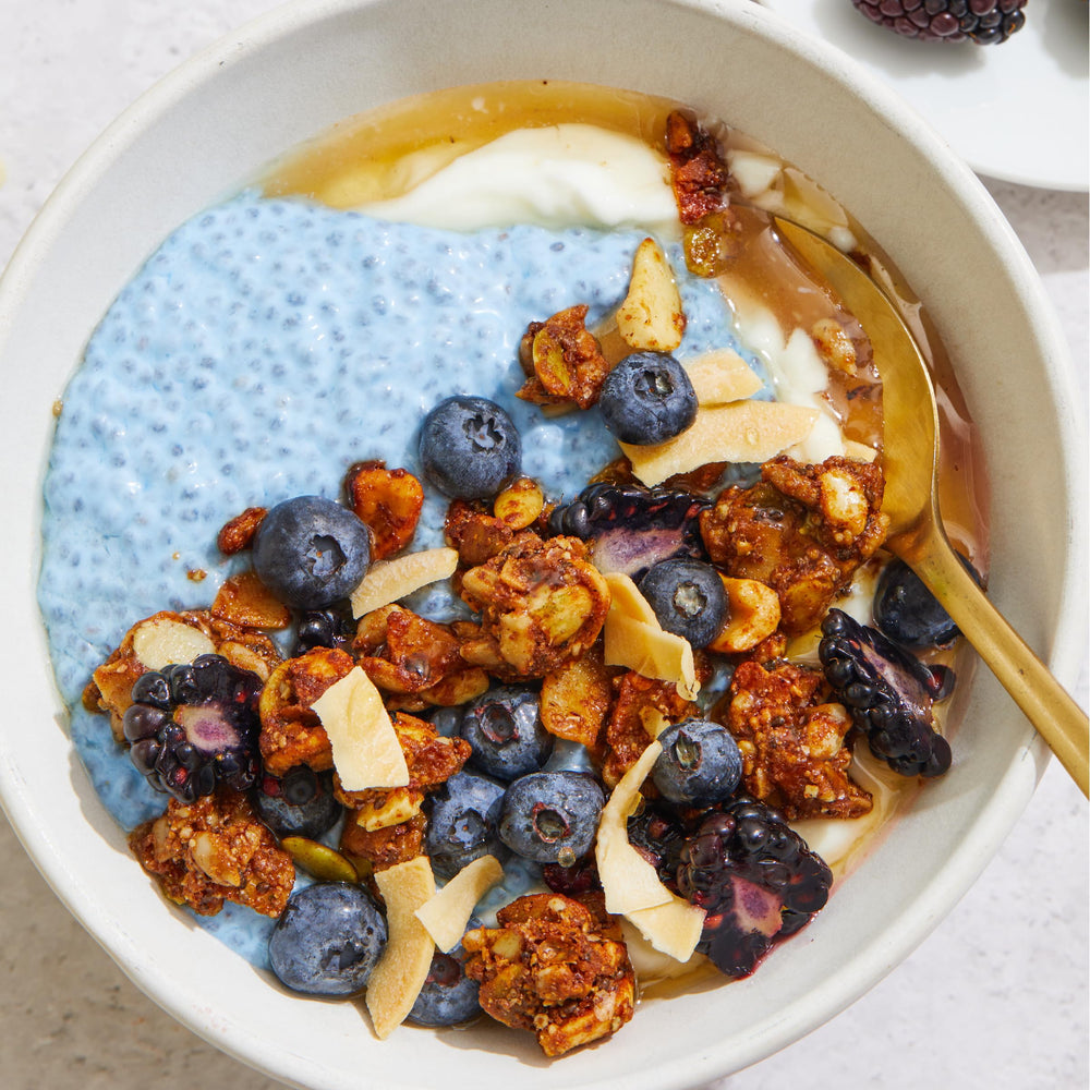 Purely Elizabeth Keto Granola served with yogurt for a creamy contrast and crunch.