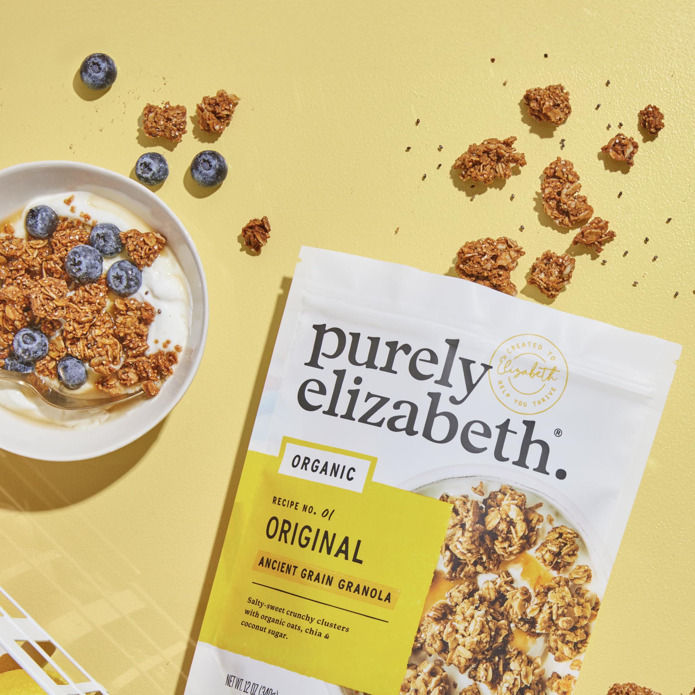 Purely Elizabeth Original Granola clusters close-up, perfect topping for smoothies.