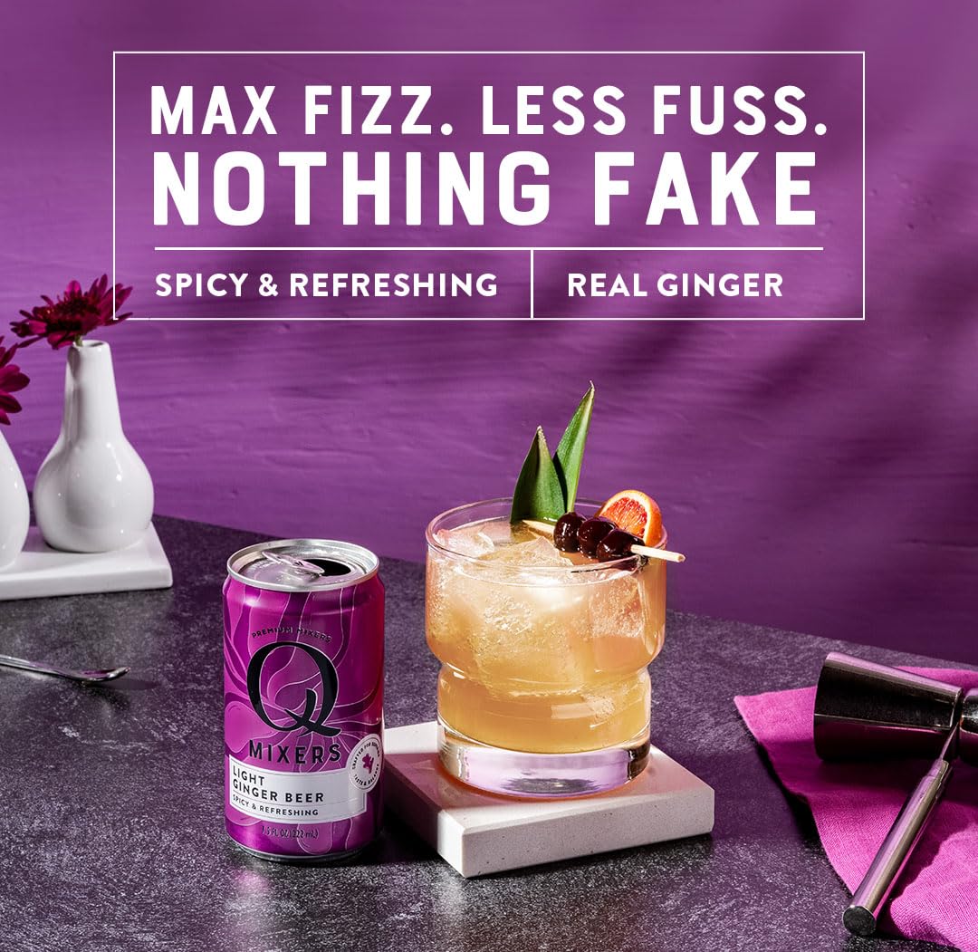 Cocktail scene using Q Mixers Light Ginger Beer with citrus garnish.