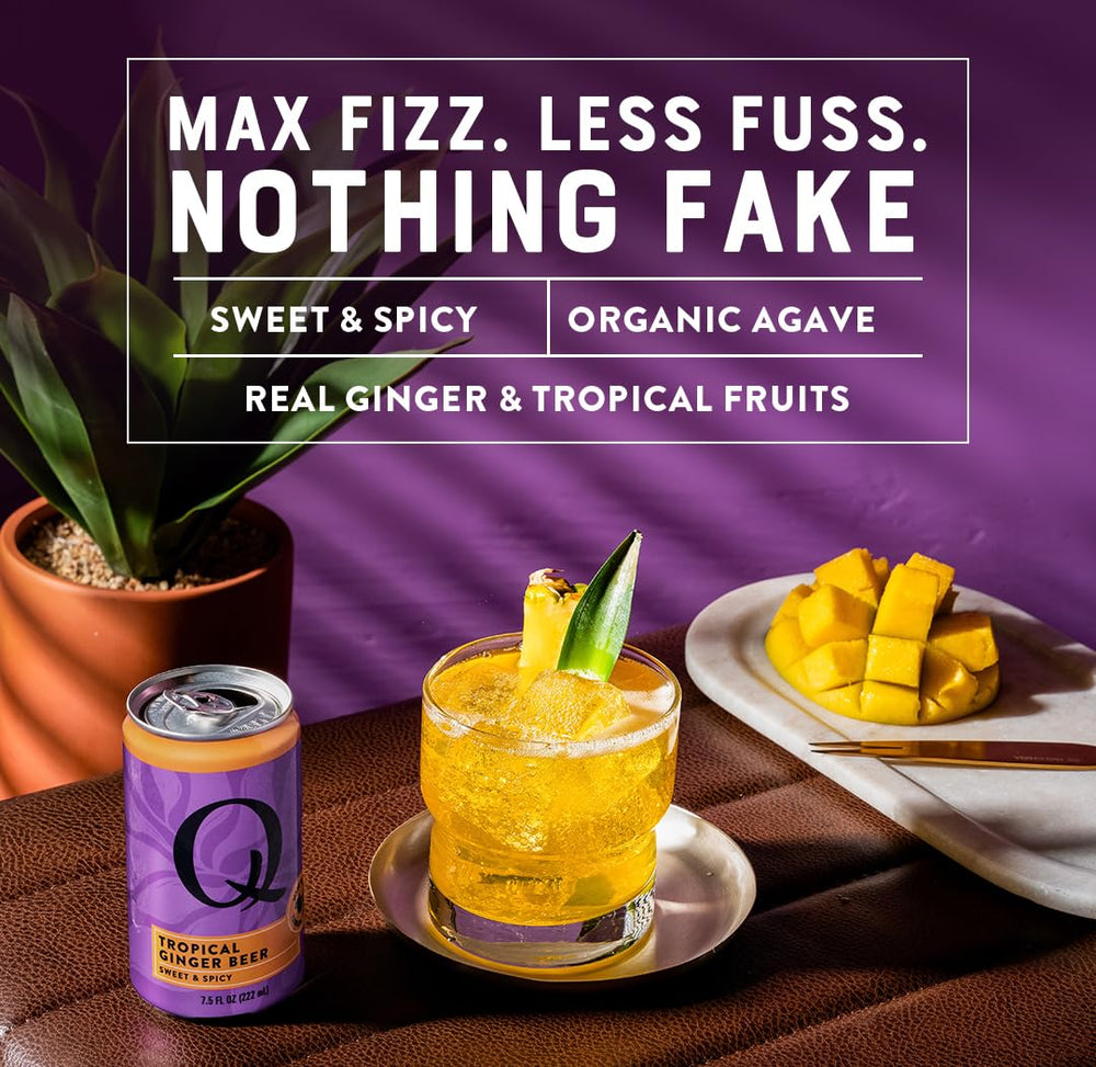 Q MIXERS Tropical Ginger Beer bottle with citrus garnish for cocktails