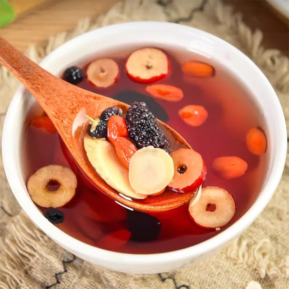 Herbal blend in bowl illustrating the six treasured ingredients.