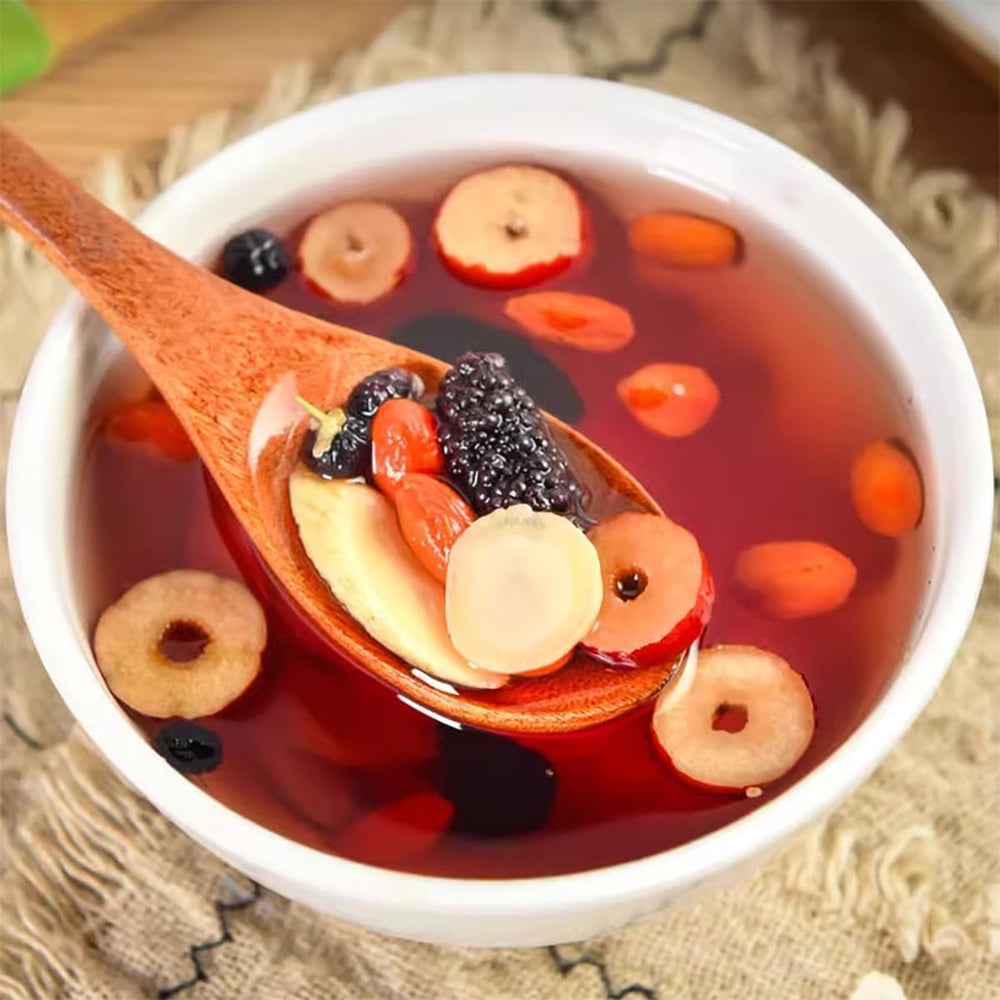 Herbal blend in bowl illustrating the six treasured ingredients.