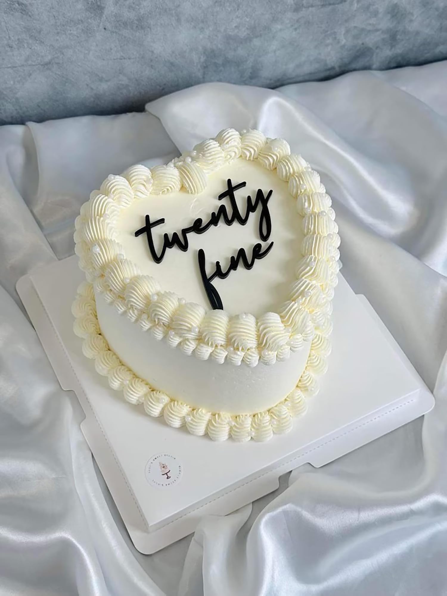 QPARTYFIRE Twenty Fine cake topper on cake adds a stylish focal point for a 20th celebration.