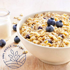 Quaker Instant Oatmeal Blueberries & Cream steaming bowl — warm, comforting breakfast.