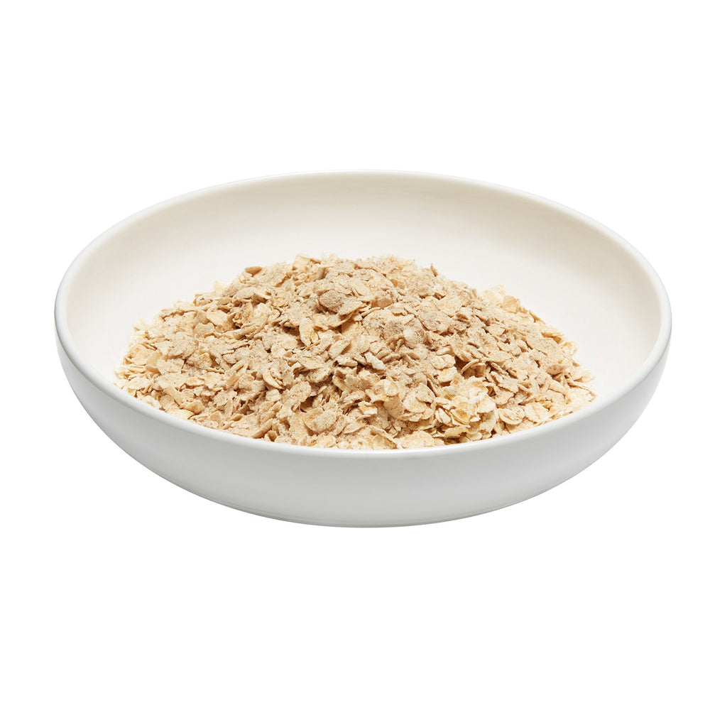 Cup of Quaker Cinnamon & Spice oatmeal ready on the table for a quick morning.