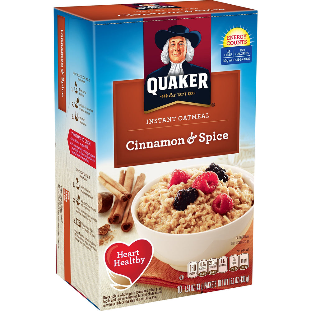 Scoop of Quaker oats measuring portions for a fast, cinnamon breakfast.