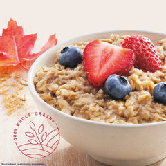 A spoonful reveals the creamy texture of Quaker Maple & Brown Sugar oats.