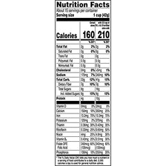 Quaker Life Original cereal squares close-up show whole grains texture.