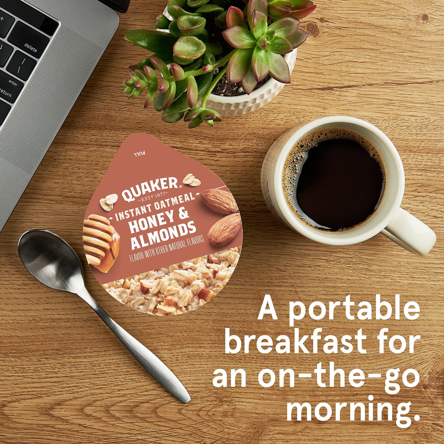 Quaker oats cup package closeup featuring whole grain oats.