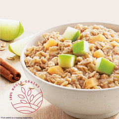 Open Quaker oatmeal packet reveals apples and cinnamon aroma.