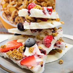 Close-up of oats and sliced almonds in Quaker granola.