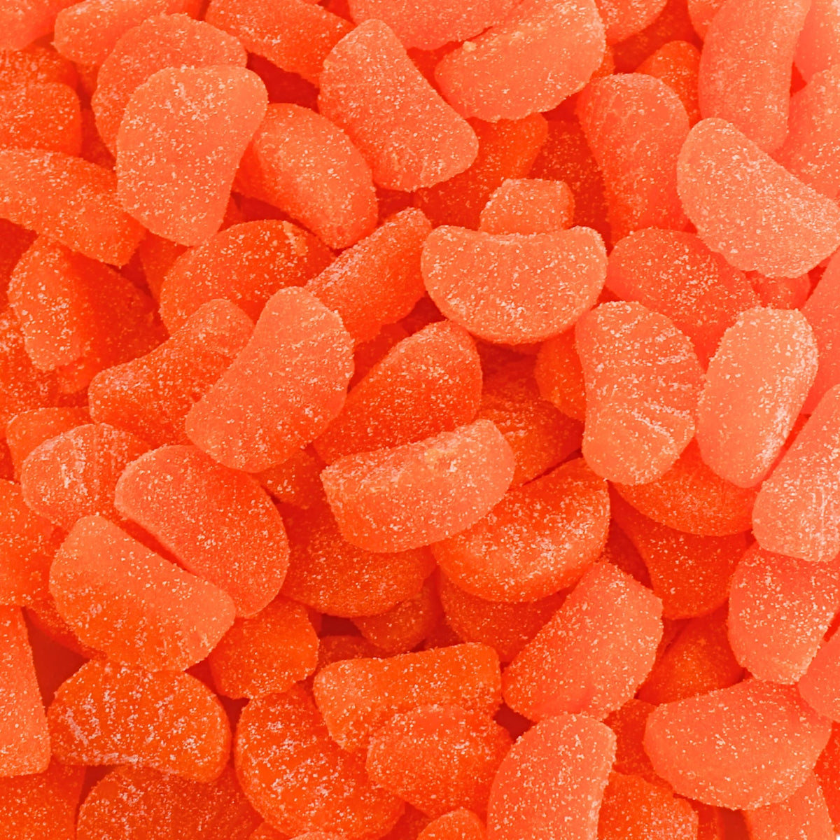 Queen City Candy Cave bright orange slices close-up for fruity snacking and sharing.