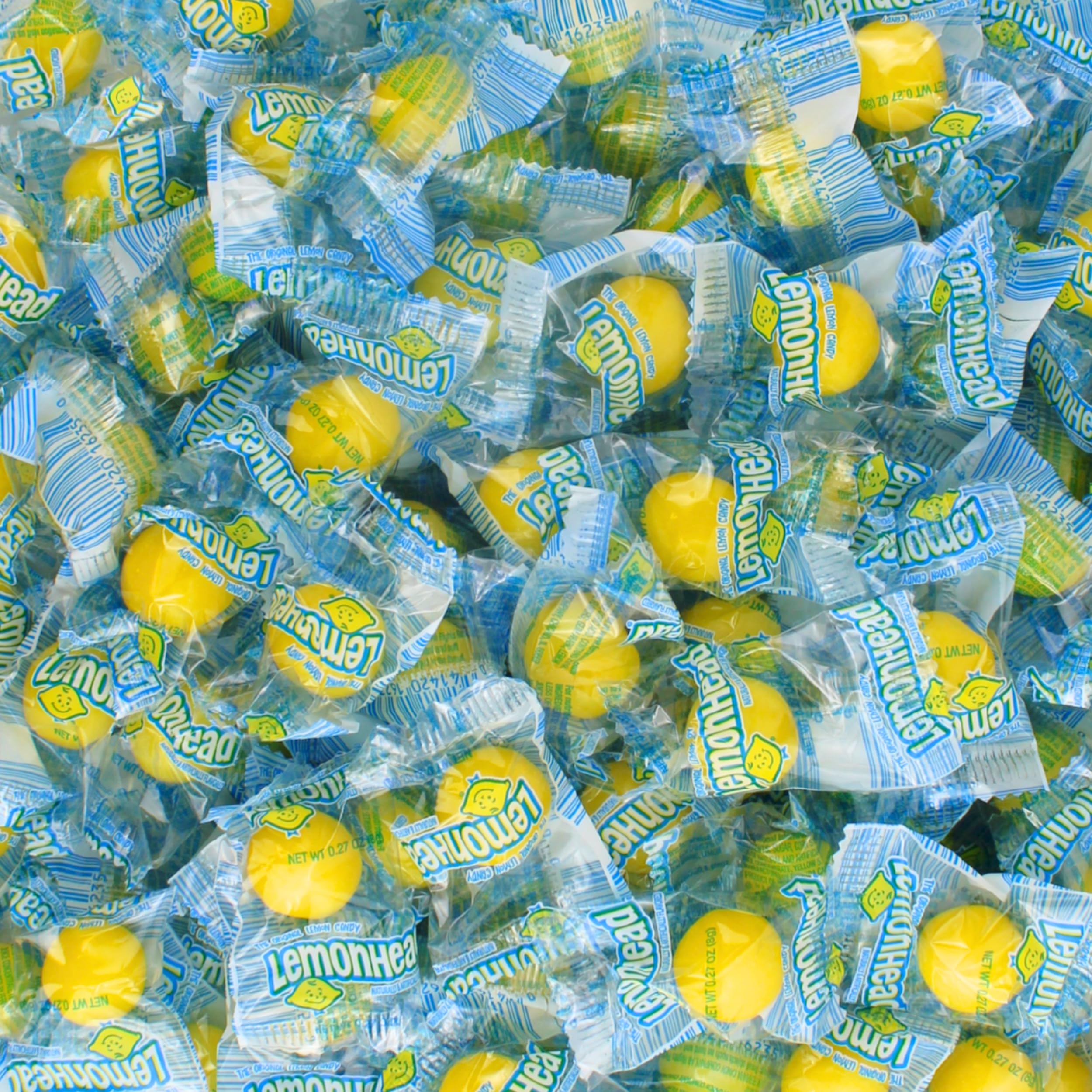 Queen City Candy Cave lemon candy bulk wrap displays individually wrapped lemon heads for easy sharing and gifting.