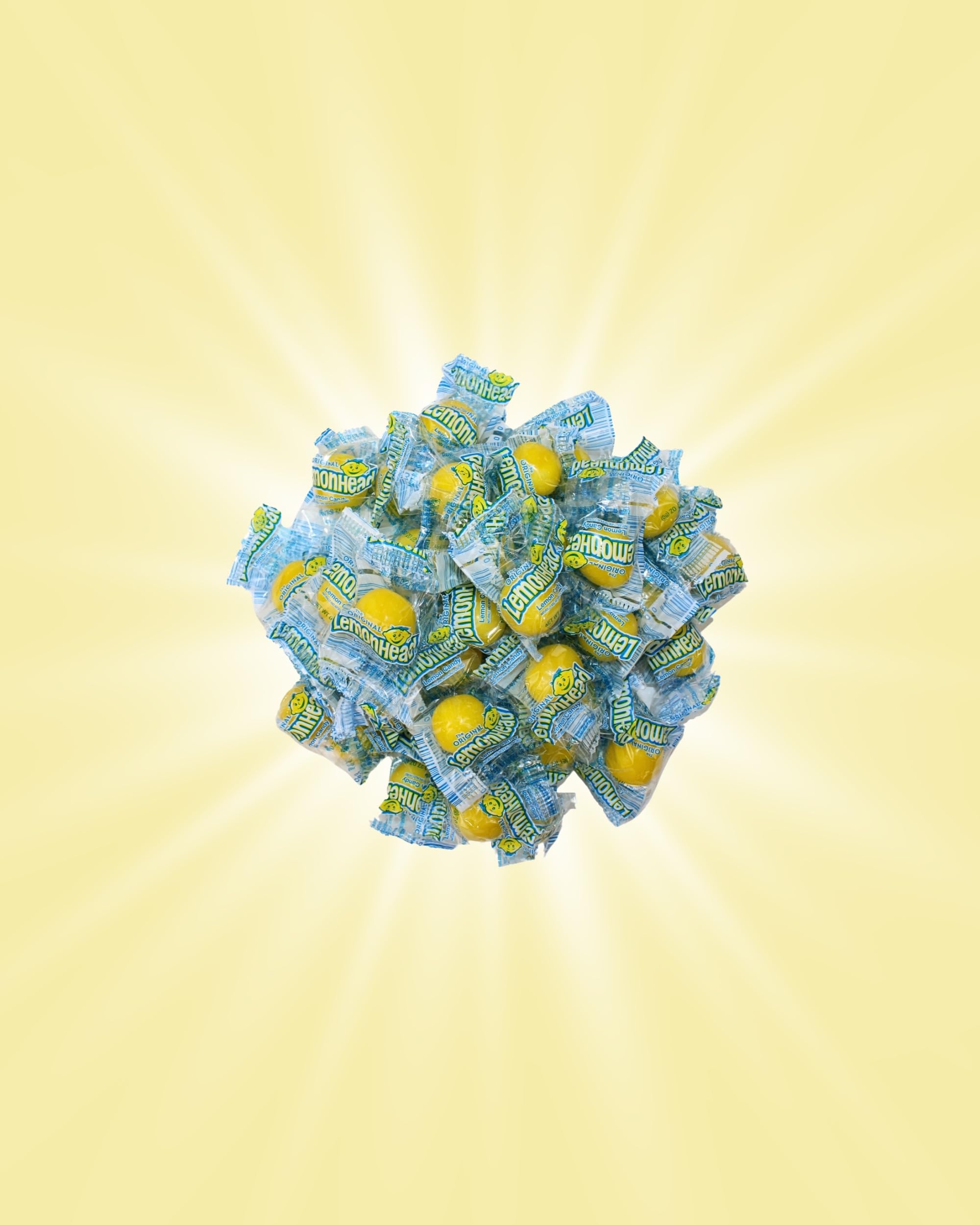 Queen City Candy Cave bright yellow lemon heads for nostalgic snacking.