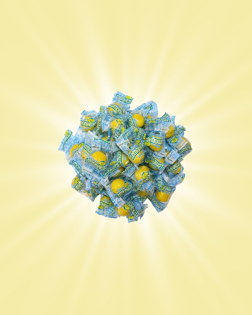Queen City Candy Cave bright yellow lemon heads for nostalgic snacking.
