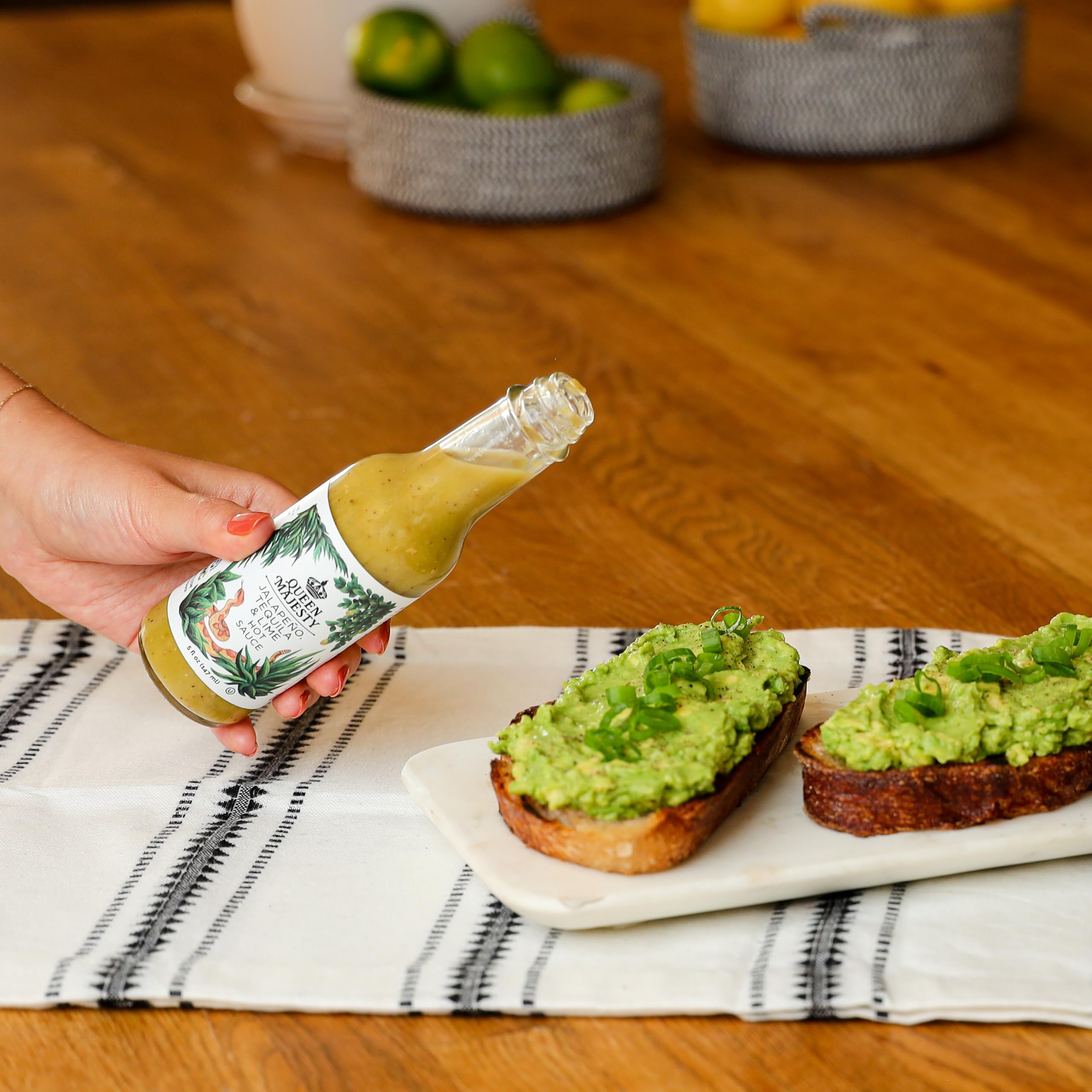 Queen Majesty Jalapeño Tequila Lime hot sauce pour—bright jalapeño and lime notes.
