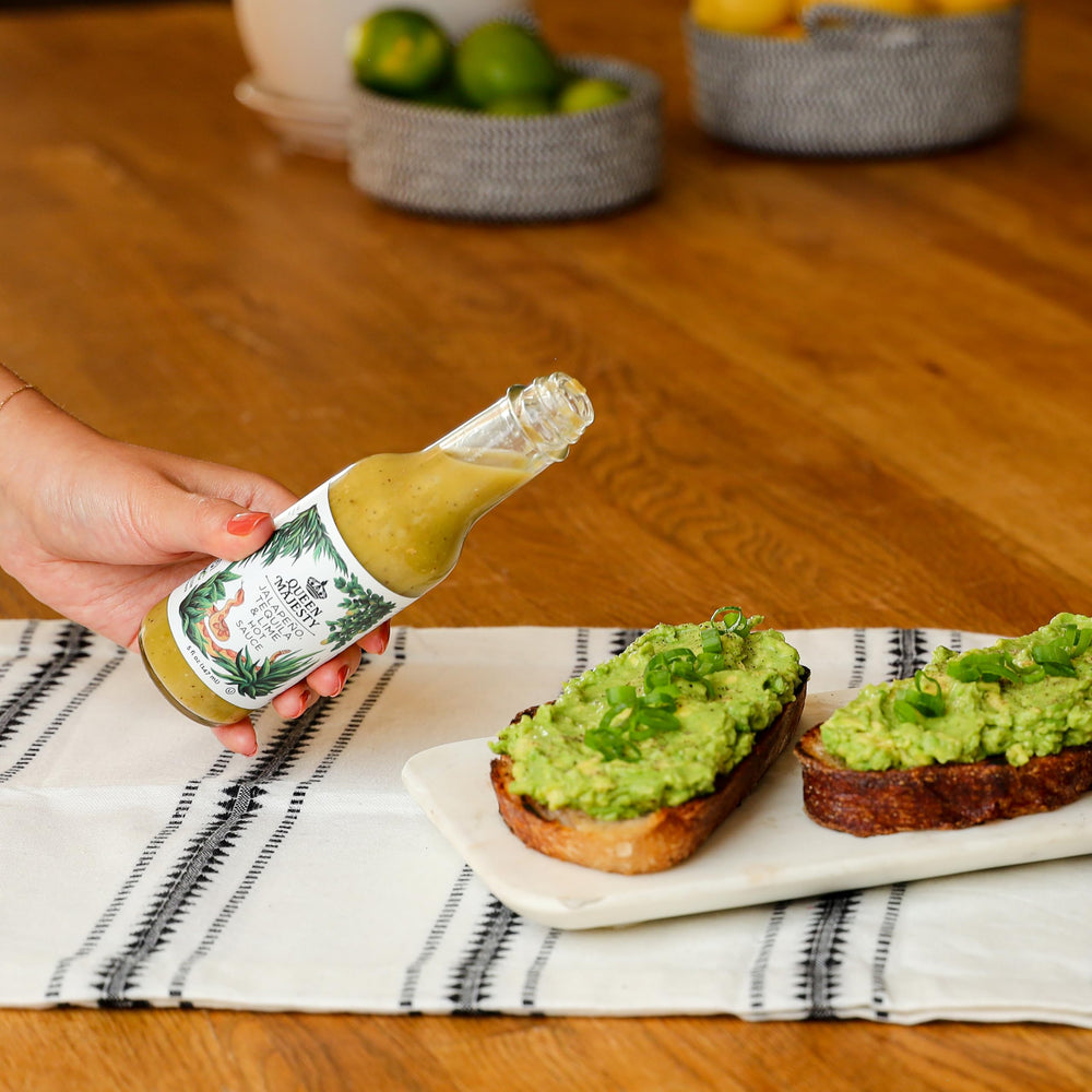 Queen Majesty Jalapeño Tequila Lime hot sauce pour—bright jalapeño and lime notes.
