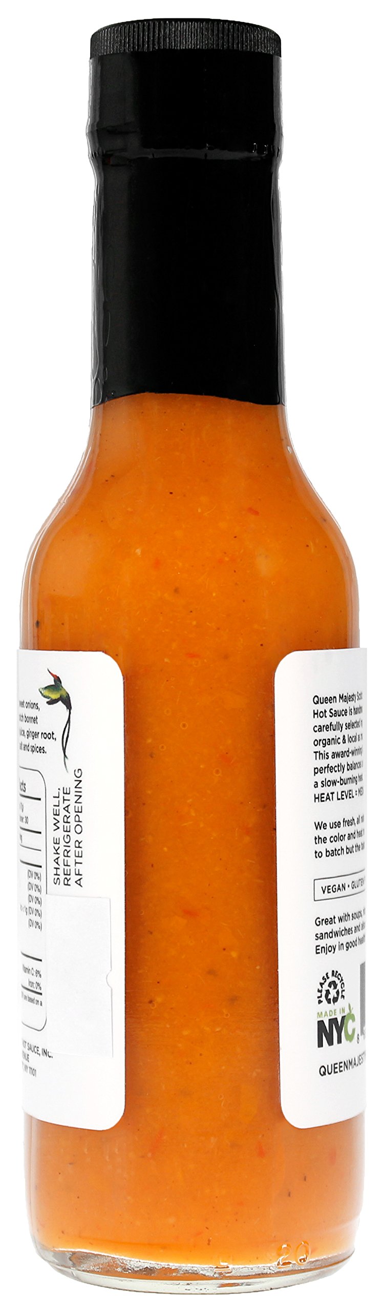 Queen Majesty wings dipping with sauce demonstrates versatile heat for wings.