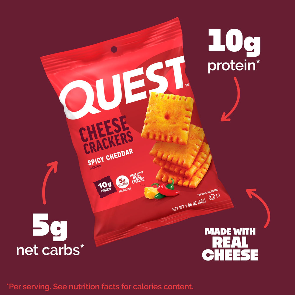 Quest Spicy Cheddar Crackers in hand for a protein-forward snack.