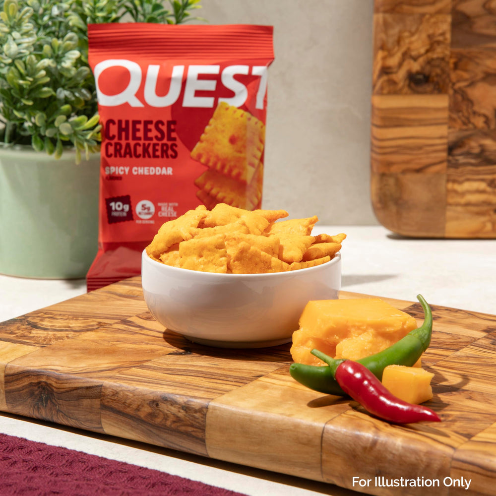 Quest Spicy Cheddar Crackers gym bag scene promotes post-workout refuel.