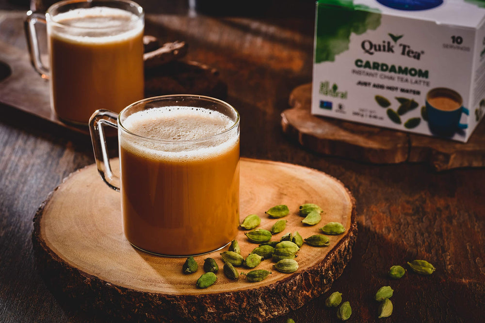 QuikTea Cardamom Instant Chai Latte mug with frothy latte for cozy moments
