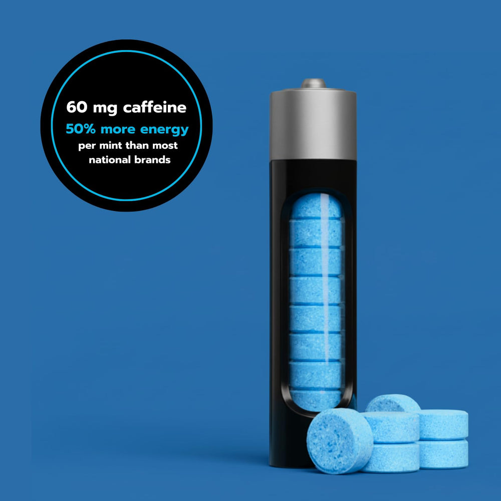 Close-up of Rally Energy Caffeine Mints tablet showing fast-dissolve action.