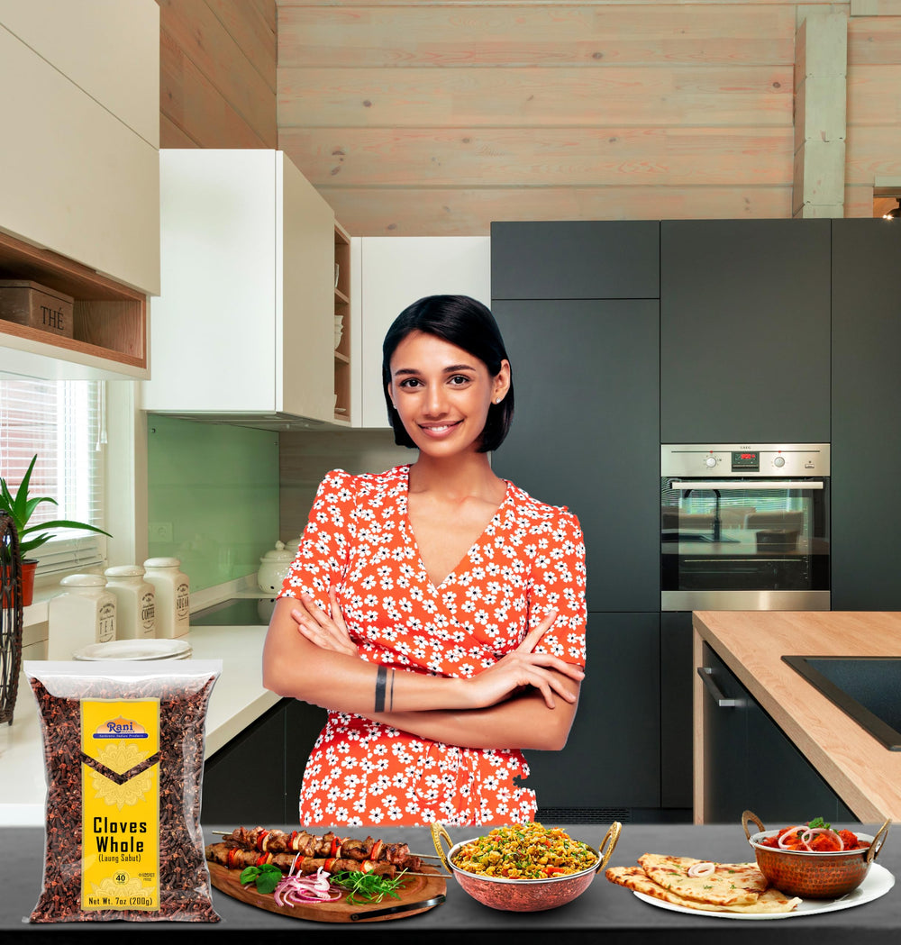 Rani Cloves Whole spice pile, showcasing high oil content for robust taste.