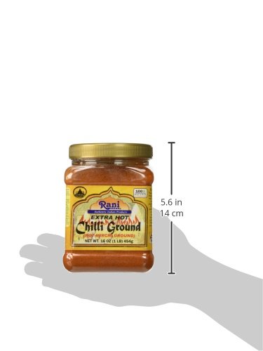 Rani Extra Hot Chilli Powder in steaming curry pot.