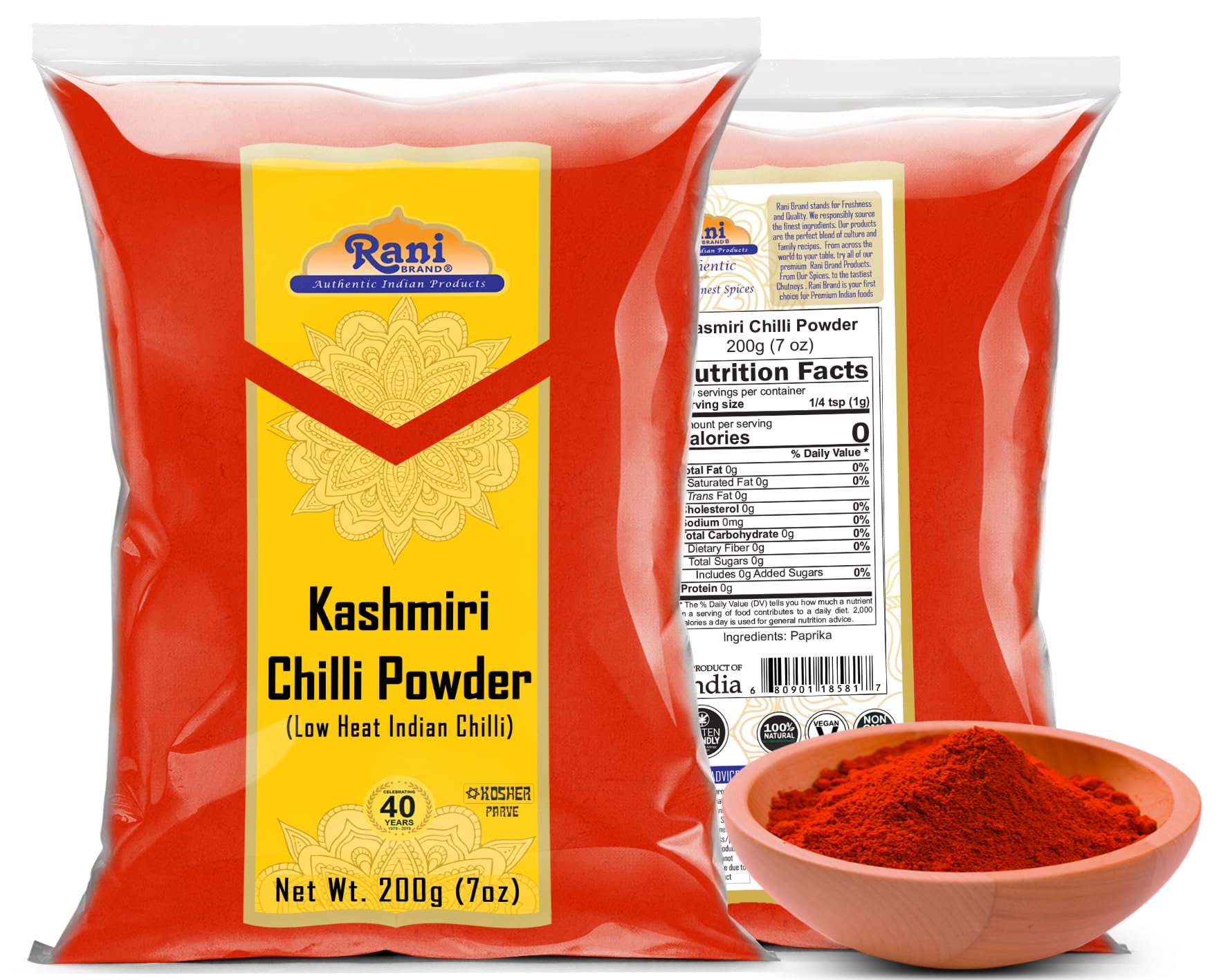 Rani Deggi Mirch powder spoon dusting enhances sauces with mild heat