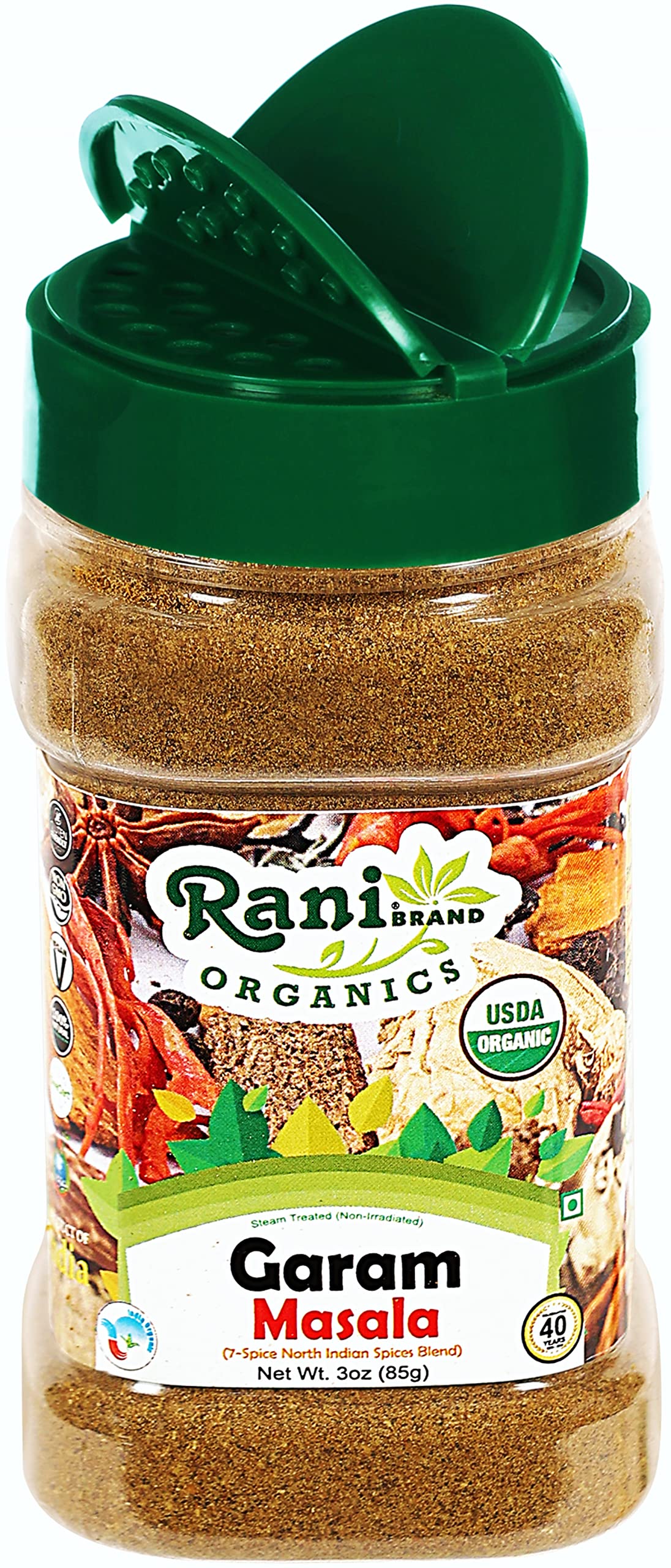Spice mix in a bowl with measuring spoons for recipe prep.