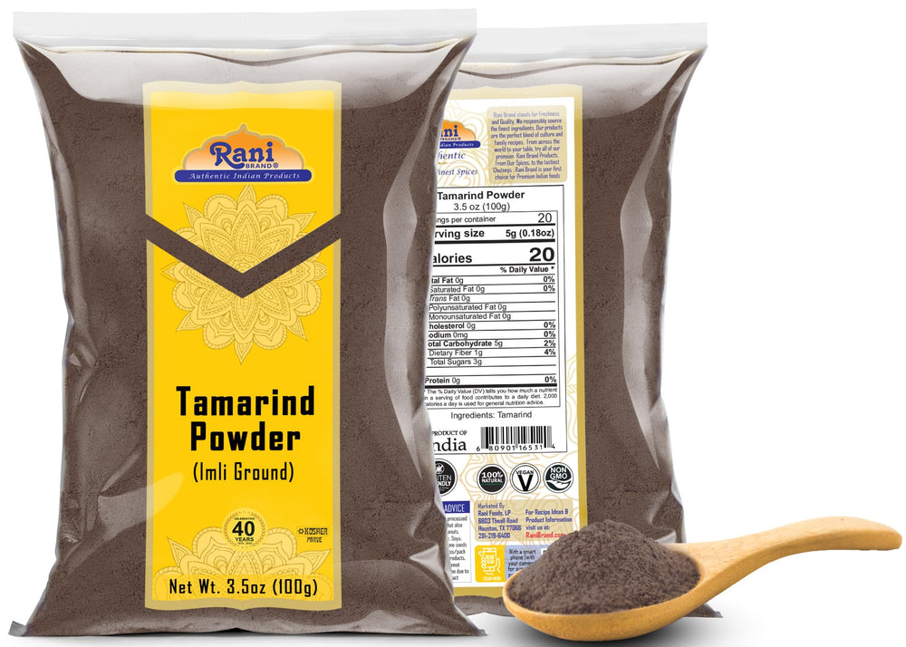 Rani Tamarind Powder dry ingredient spread on wooden board