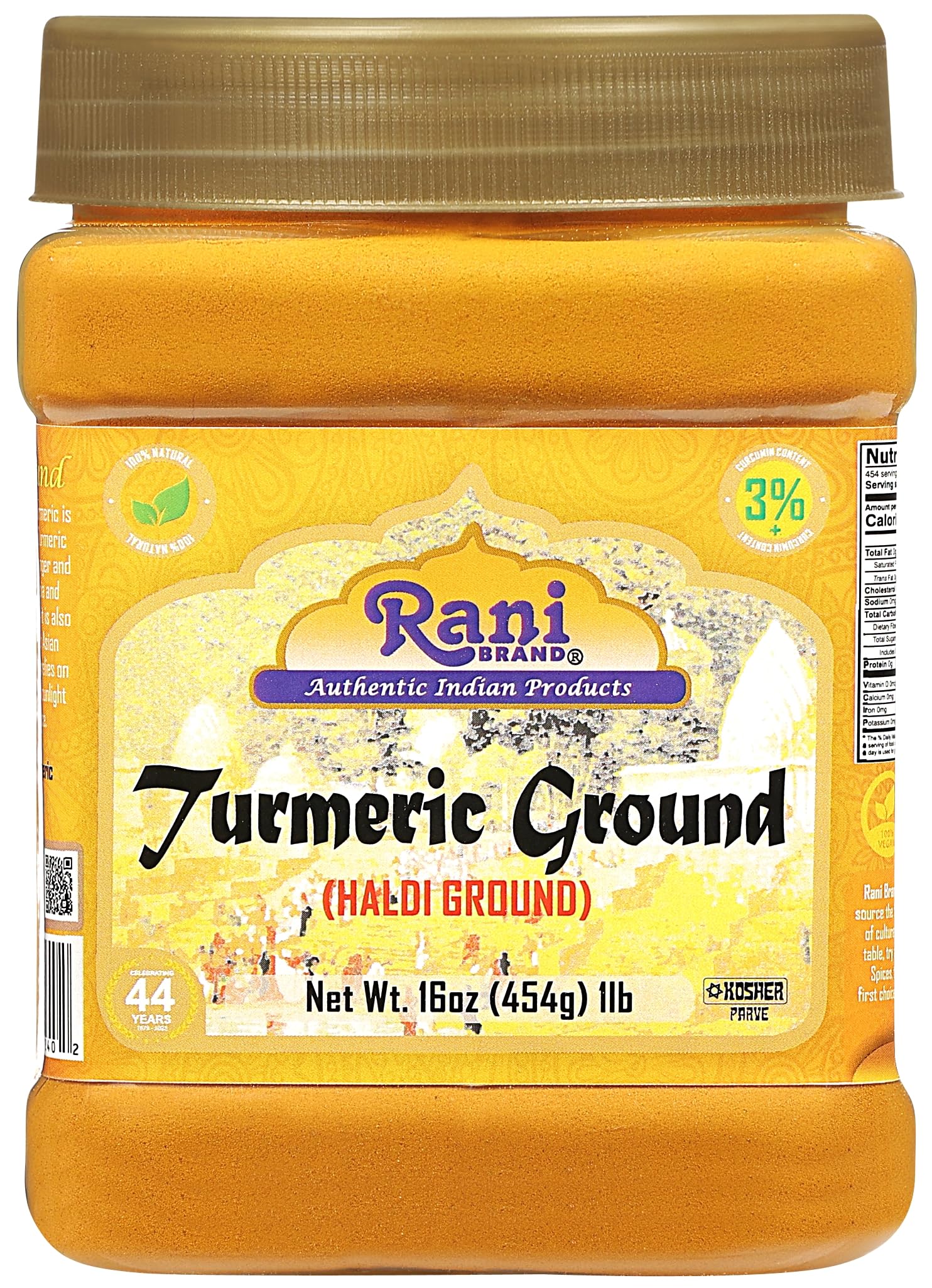 Rani Turmeric Haldi root powder jar shows vibrant orange gold color for flavorful cooking.