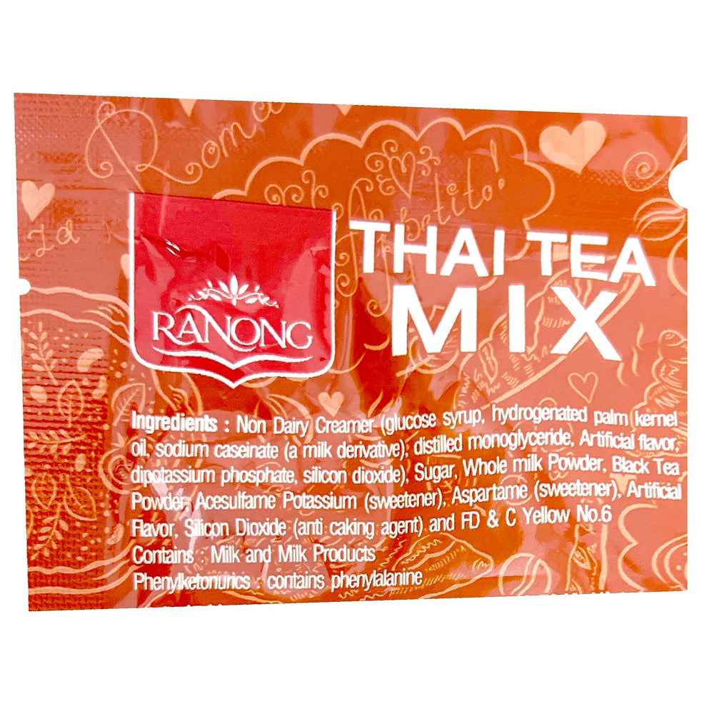 Ranong Tea being poured into a glass for hot or iced serving.