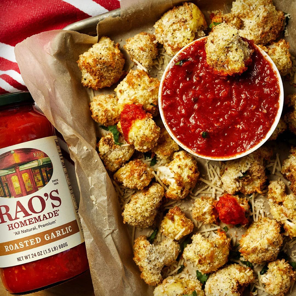 Family dinner setup featuring Rao's sauce as a comforting Italian centerpiece.