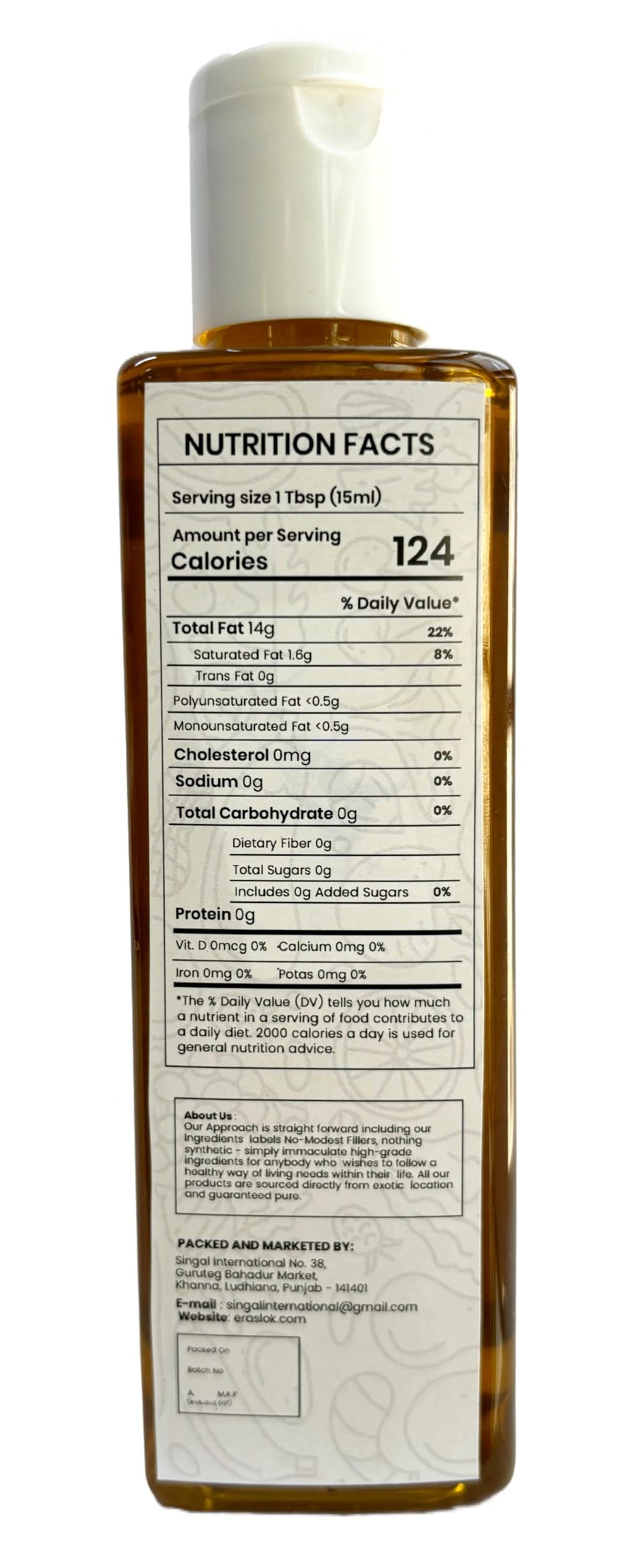 Raslok wood-pressed mustard oil pour; great for frying and dressings.
