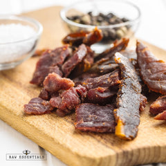 Raw Essentials bacon and sausage prep scene showing practical curing with No. 1.