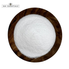 Raw Essentials vinegar powder sprinkled into a bowl for tangy dressings