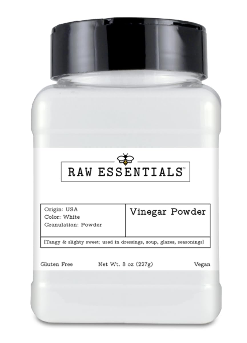 Raw Essentials white vinegar powder bottle showing convenient tangy flavor enhancement