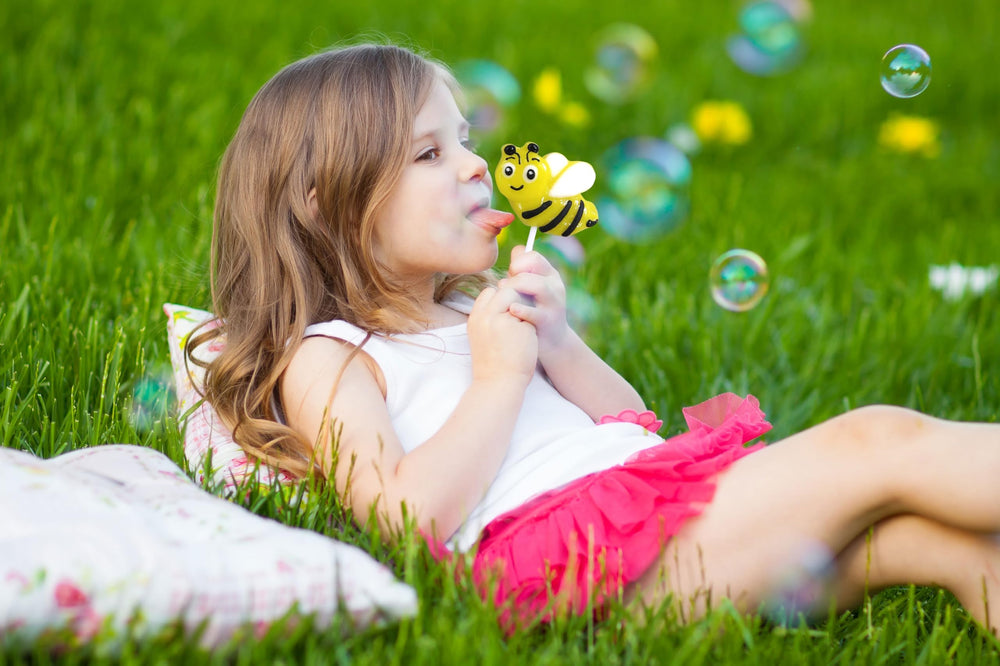 RBBZ Party bee candy lollipops in colorful favor bags.