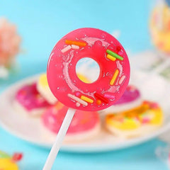 RBBZ Party donut lollipop closeup with sprinkles, colorful celebration treat.