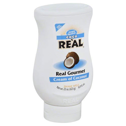 Real Coco Coco Real Cream of Coconut 22 oz bottle pour for tropical cocktails
