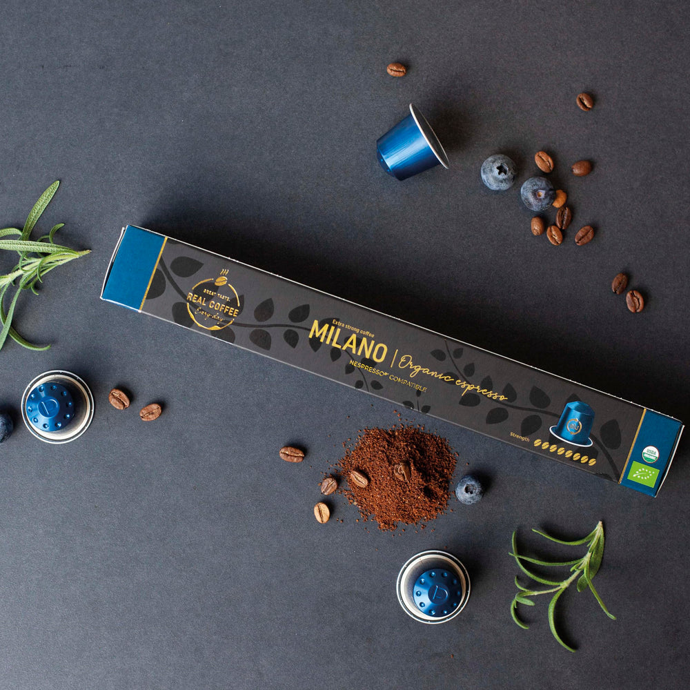 REAL COFFEE MILANO aluminium capsules close-up highlighting recyclable packaging.