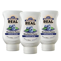 Reàl Infused Exotics blueberry bottle front for vibrant beverages and easy mixing.