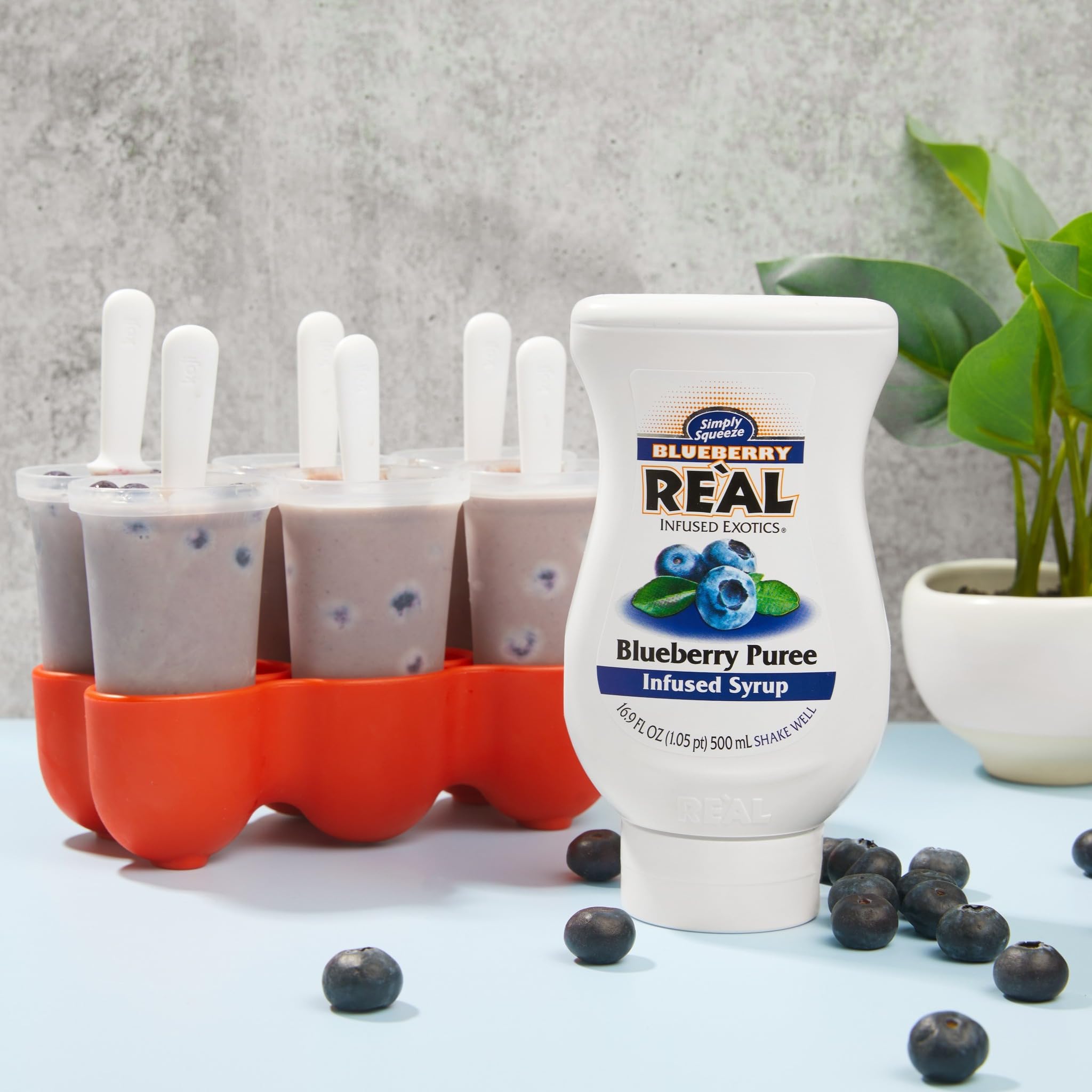 Reàl Infused Exotics blueberry texture syrup captures glossy consistency for desserts.