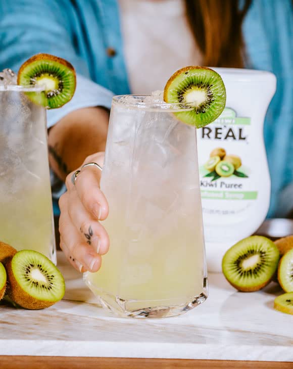 Real Infused Exotics Kiwi Puree Syrup volcano spout for drip-free pouring.