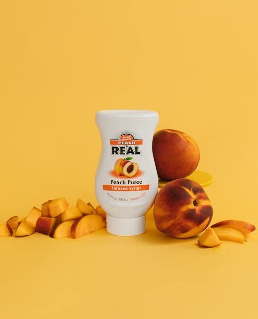 Real Infused Exotics Peach glass serving with inviting aroma