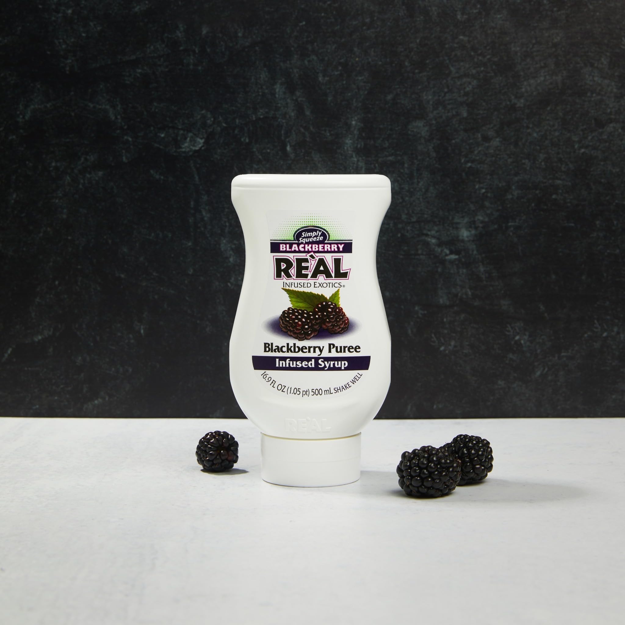 Volcano-spout dispensing on Reàl Infused Exotics bottle for drip-free pouring