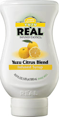 Reàl Infused Exotics Yuzu Syrup bottle close-up for bold cocktails.