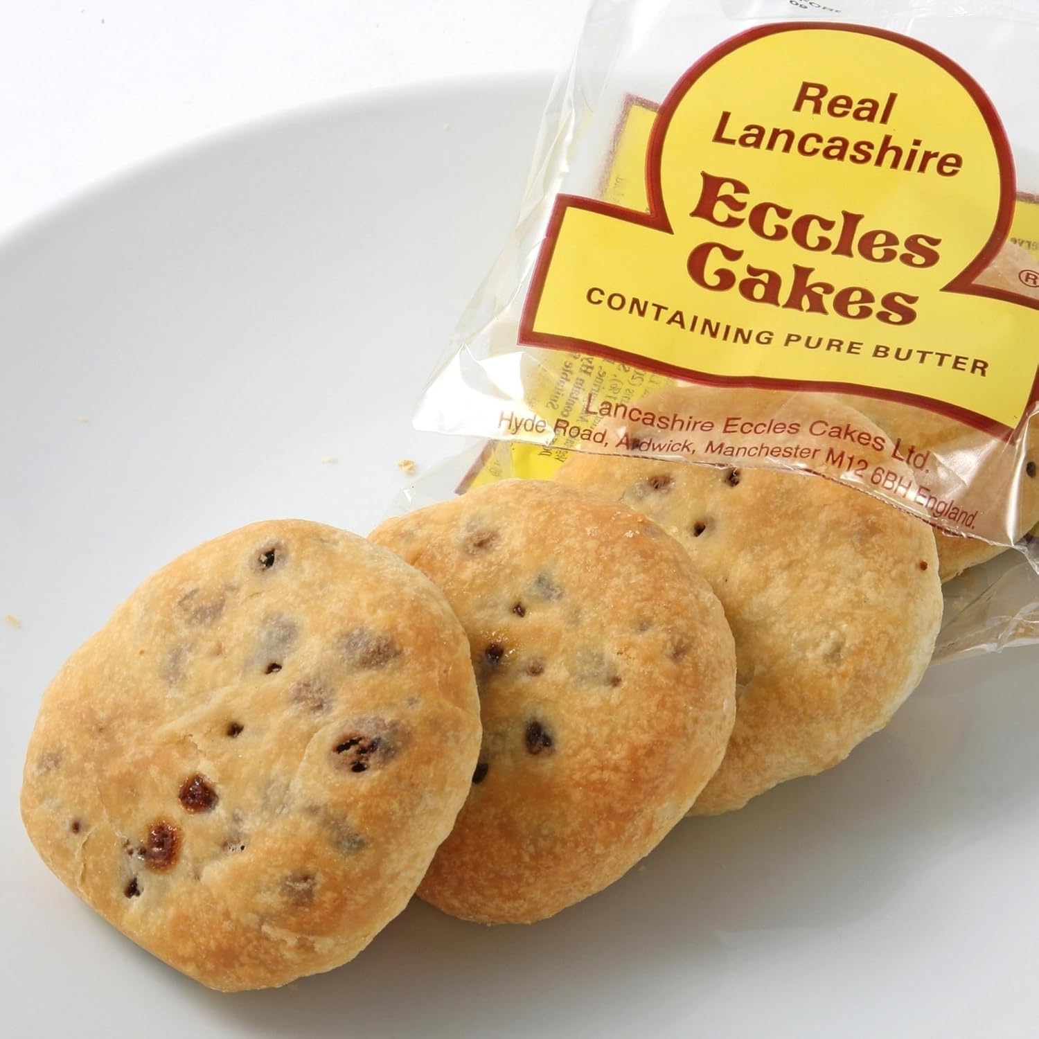 Real Lancashire Eccles Cakes cross-section reveals currant filling, perfect for a fruity snack.