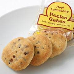 Real Lancashire Eccles Cakes cross-section reveals currant filling, perfect for a fruity snack.